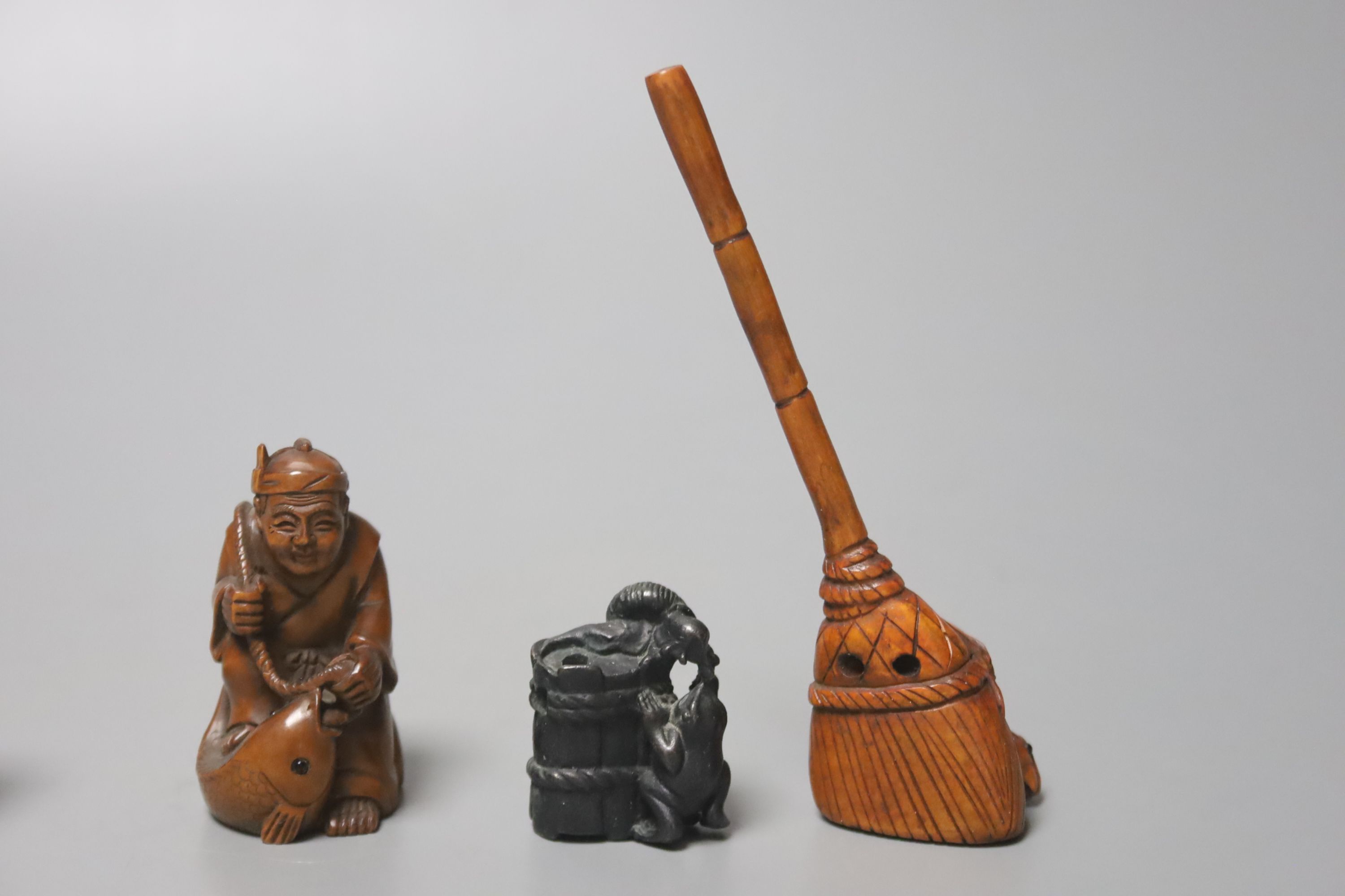 A collection of Japanese netsuke, mostly 20th century, one bronze